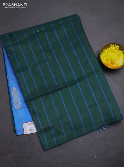 Banana pith saree bottle green and teal blue with allover stripe pattern in borderless style