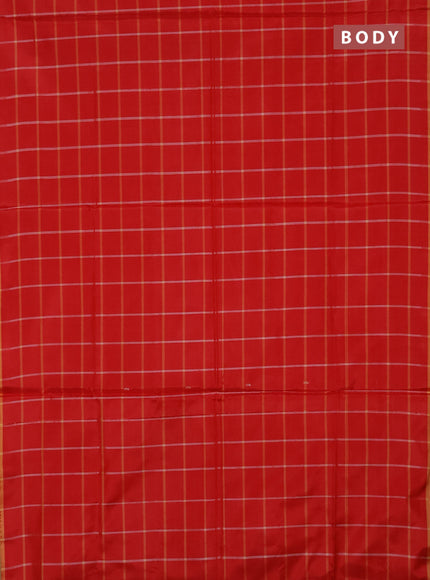 Banana pith saree red and pale orange with allover checked pattern in borderless style