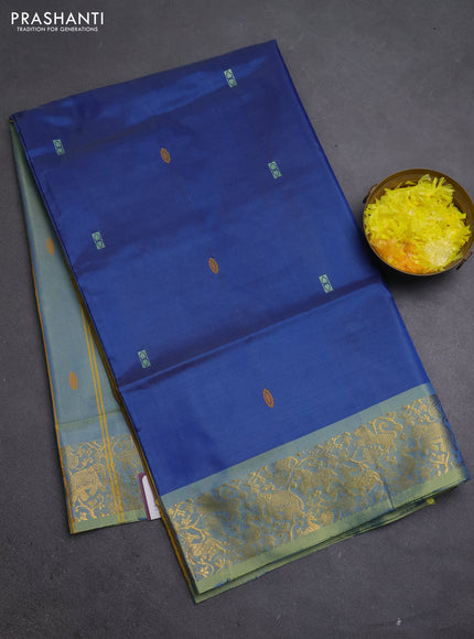 Banana pith saree blue and dual shade of yellow with thread woven buttas and zari woven border