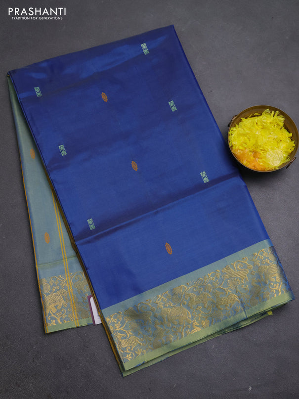 Banana pith saree blue and dual shade of yellow with thread woven buttas and zari woven border
