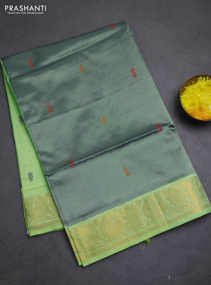 Banana pith saree dual shade of green and fluorescent green with thread woven buttas and zari woven border