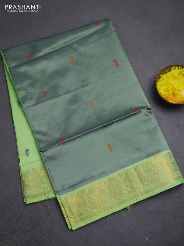 Banana pith saree dual shade of green and fluorescent green with thread woven buttas and zari woven border