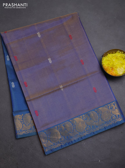 Banana pith saree dual shade of blue and peacock blue with thread woven buttas and zari woven buttas