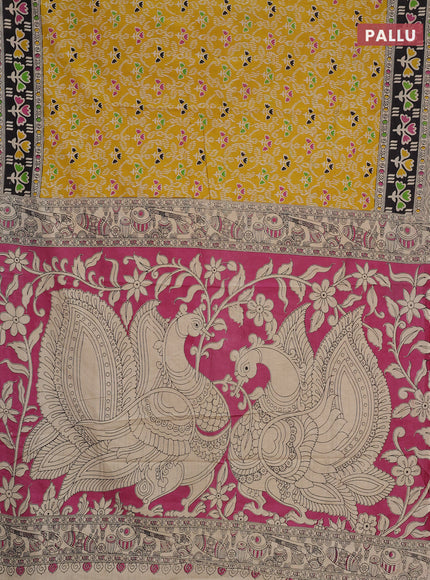 Kalamkari cotton saree yellow and black with allover prints and printed border