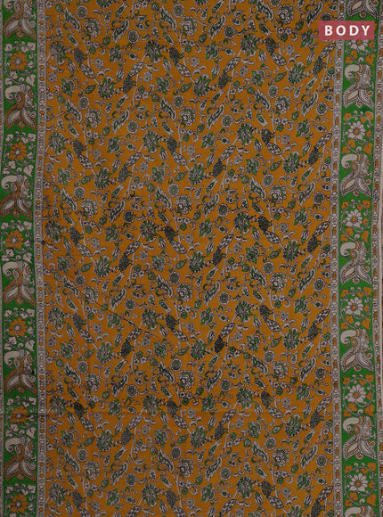 Kalamkari cotton saree yellow and green with allover prints and printed border