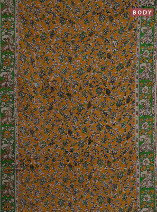 Kalamkari cotton saree yellow and green with allover prints and printed border