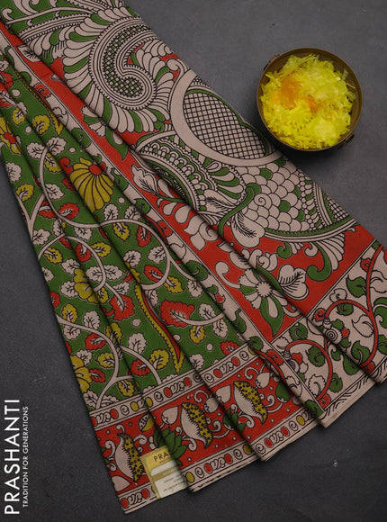 Kalamkari cotton saree light green and orange with allover prints and printed border