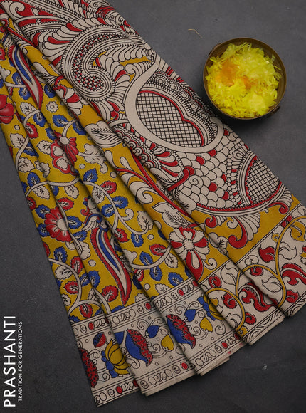 Kalamkari cotton saree yellow and beige with allover prints and printed border