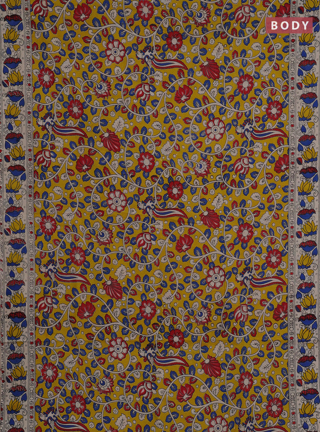 Kalamkari cotton saree yellow and beige with allover prints and printed border