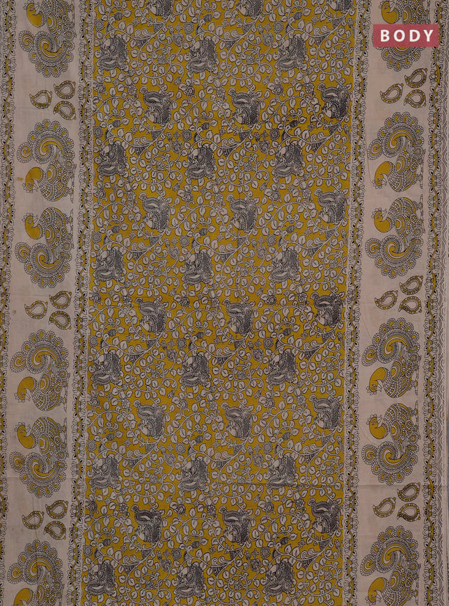 Kalamkari cotton saree yellow and beige with allover prints and long printed border