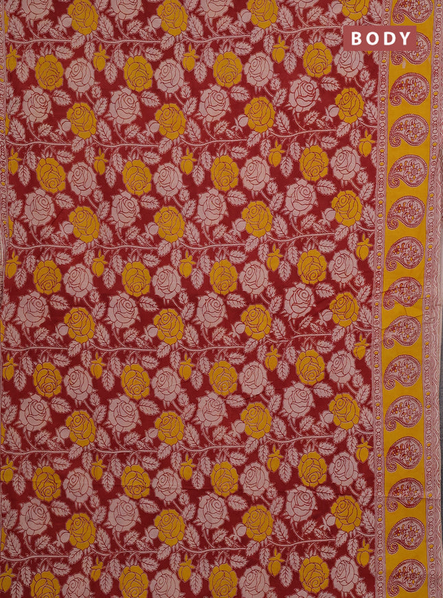 Kalamkari cotton saree maroon and yellow with allover prints and butta printed border