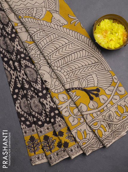 Kalamkari cotton saree black and yellow with allover prints and printed border