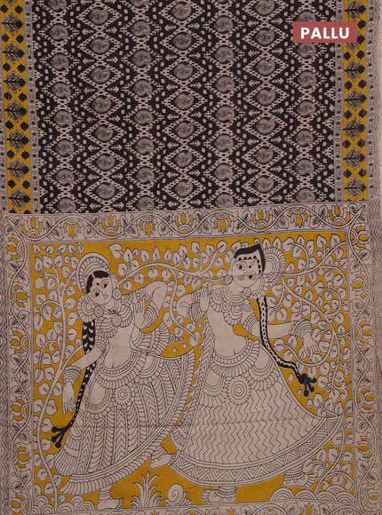 Kalamkari cotton saree black and yellow with allover prints and printed border