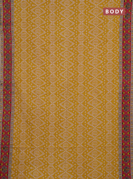 Kalamkari cotton saree yellow and red with allover prints and printed border
