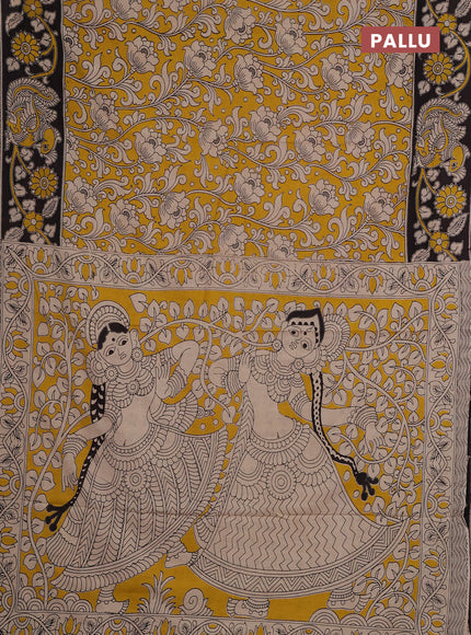 Kalamkari cotton saree yellow and black with allover prints and printed border