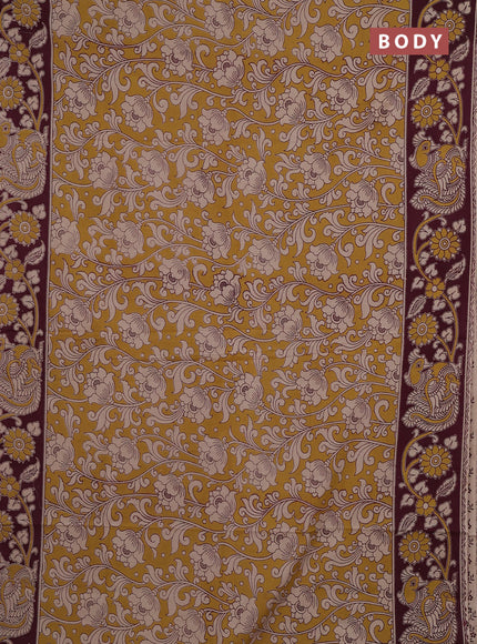 Kalamkari cotton saree yellow and wine with allover prints and printed border