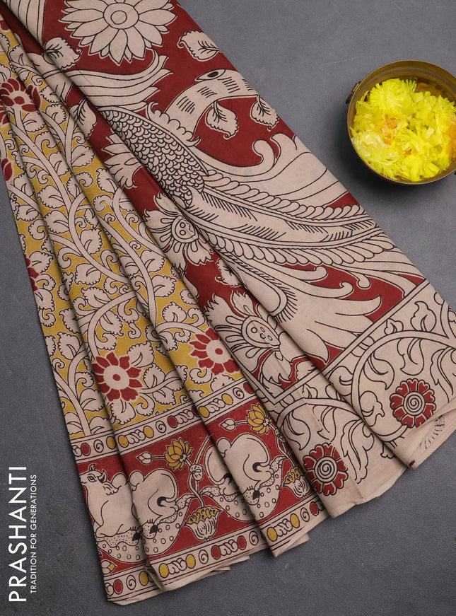 Kalamkari cotton saree yellow and brown with allover prints and pichwai printed border