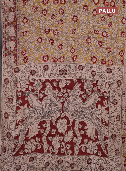 Kalamkari cotton saree yellow and brown with allover prints and pichwai printed border