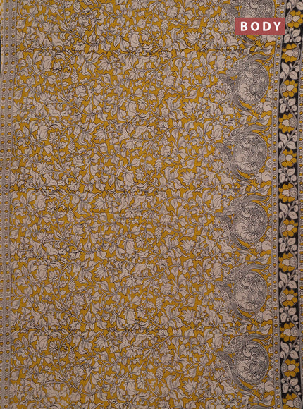 Kalamkari cotton saree yellow and black with allover prints and printed border