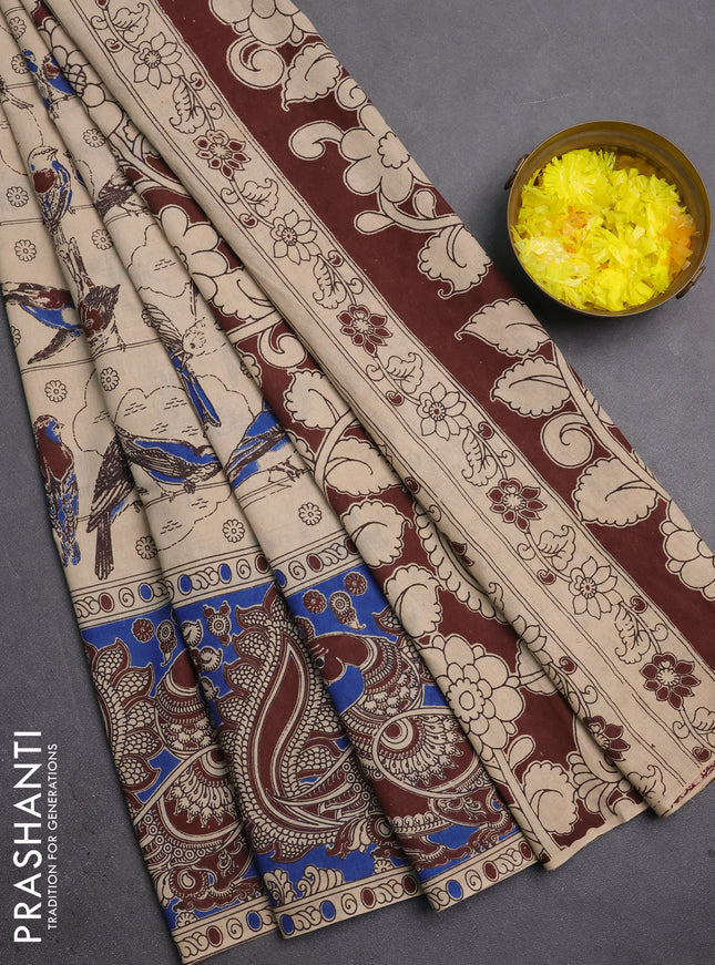 Kalamkari cotton saree beige and blue with allover prints and long printed border