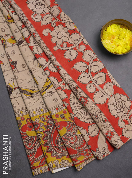 Kalamkari cotton saree beige and yellow with allover prints and long printed border