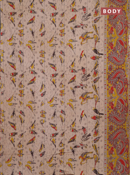 Kalamkari cotton saree beige and yellow with allover prints and long printed border