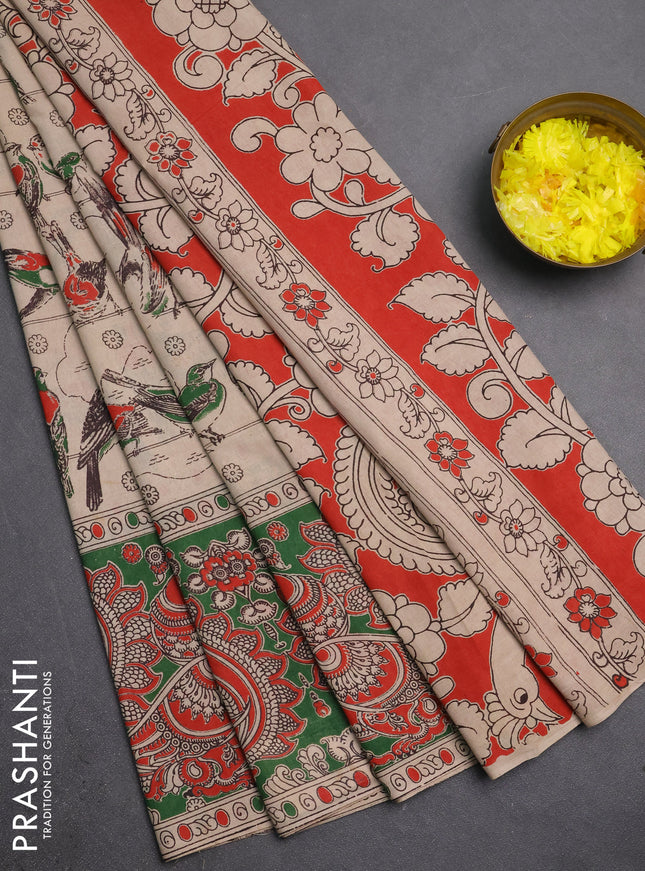 Kalamkari cotton saree beige and green with allover prints and long printed border