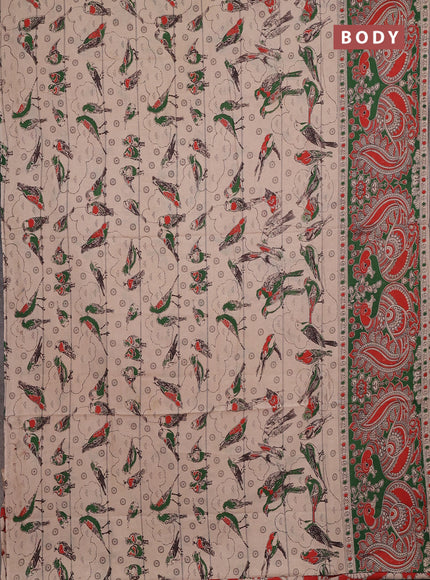 Kalamkari cotton saree beige and green with allover prints and long printed border