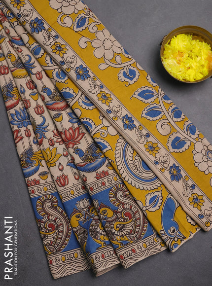 Kalamkari cotton saree beige and blue with allover prints and long printed border