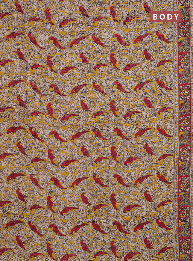 Kalamkari cotton saree yellow and red with allover prints and printed border