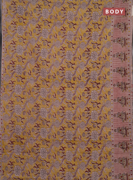 Kalamkari cotton saree mustard yellow and beige with allover prints and printed border