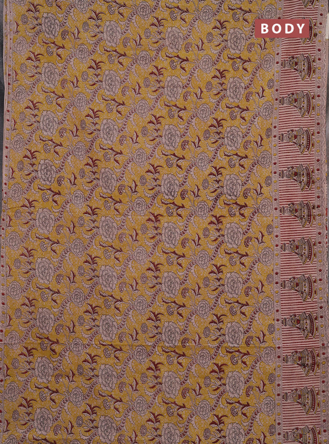 Kalamkari cotton saree mustard yellow and beige with allover prints and printed border