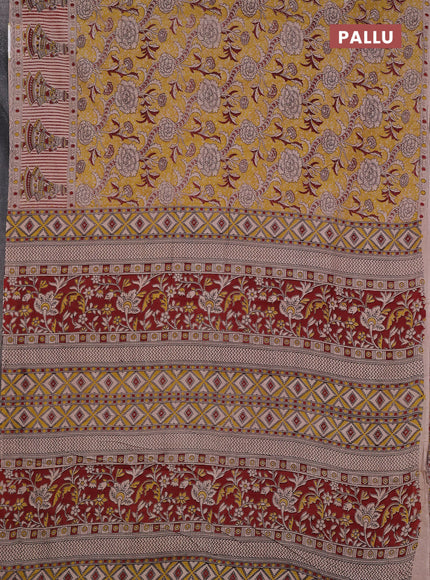 Kalamkari cotton saree mustard yellow and beige with allover prints and printed border