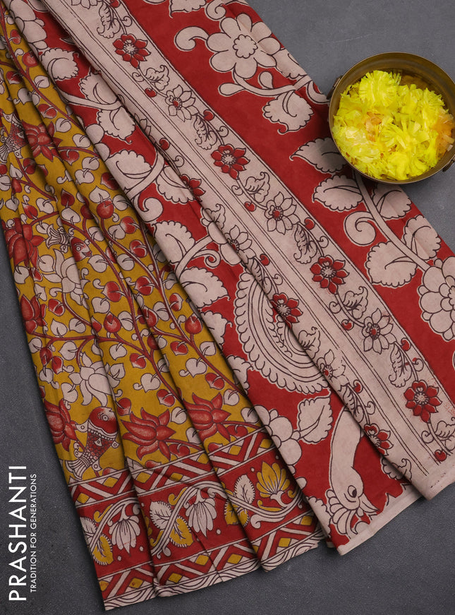 Kalamkari cotton saree mustard yellow and maroon with allover prints and printed border