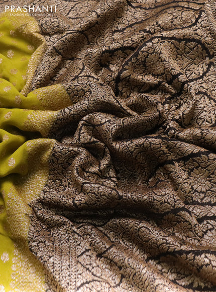 Banarasi georgette saree mustard green and black with allover thread & zari woven buttas and woven border