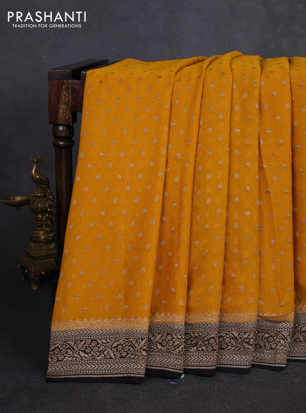 Banarasi georgette saree mustard yellow and black with allover thread & zari woven buttas and woven border