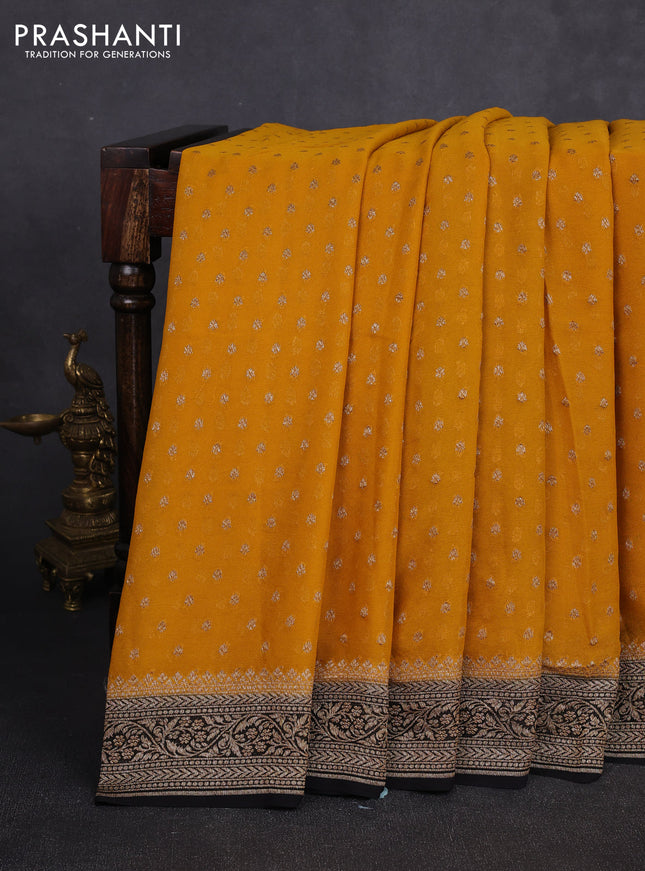 Banarasi georgette saree mustard yellow and black with allover thread & zari woven buttas and woven border