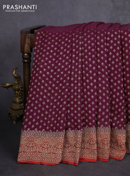 Banarasi georgette saree wine and rustic orange with allover thread & zari woven buttas and woven border