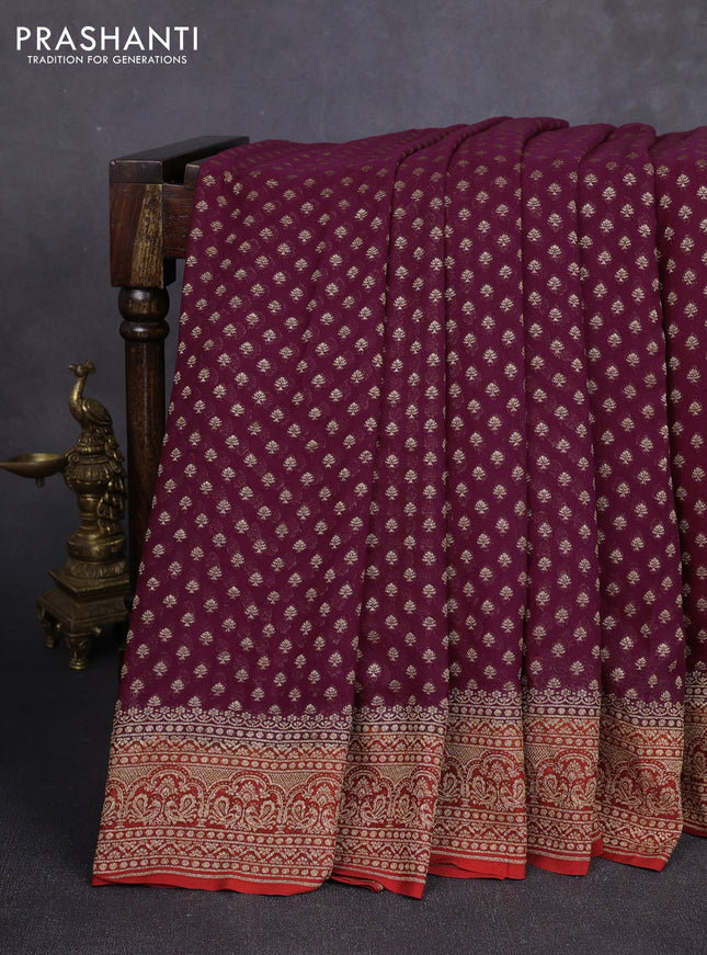 Banarasi georgette saree wine and rustic orange with allover thread & zari woven buttas and woven border