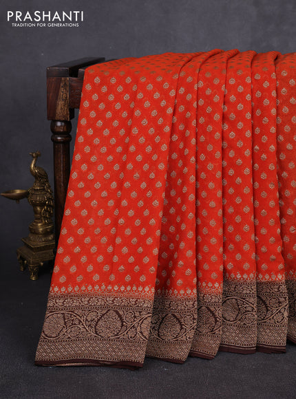 Banarasi georgette saree orange and coffee brown with allover thread & zari woven buttas and long woven border