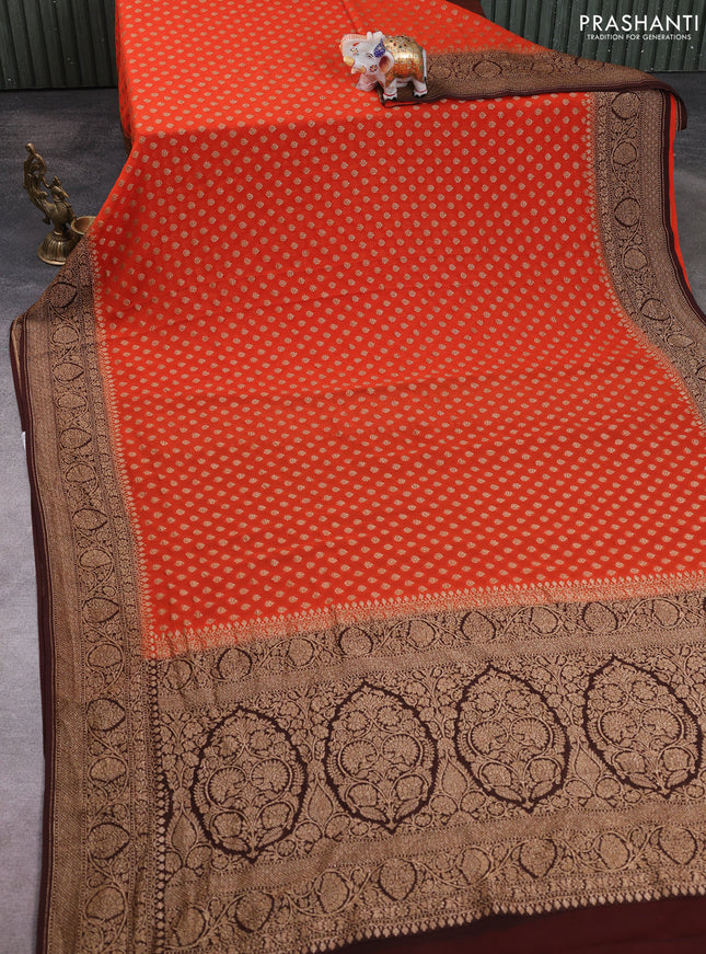 Banarasi georgette saree orange and coffee brown with allover thread & zari woven buttas and long woven border