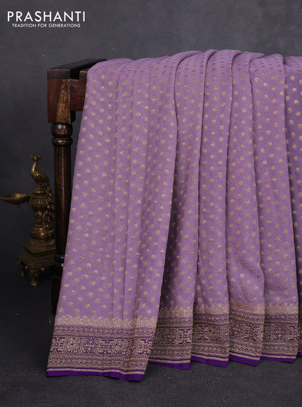 Banarasi georgette saree lavender and purple with allover thread & zari woven buttas and woven border