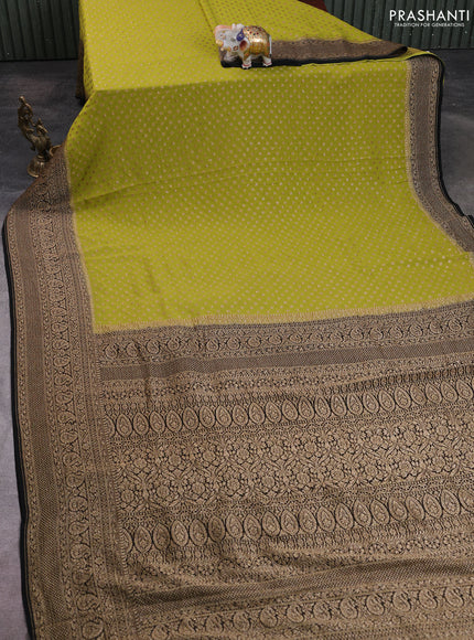 Banarasi georgette saree mustard green and black with allover thread & zari woven buttas and long woven border