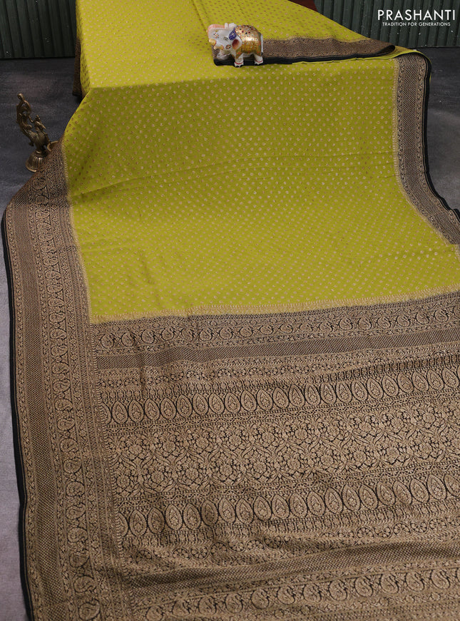 Banarasi georgette saree mustard green and black with allover thread & zari woven buttas and long woven border
