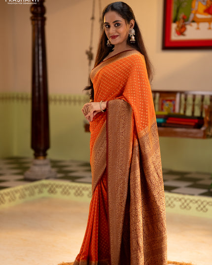 Banarasi georgette saree orange and brown with allover thread & zari woven buttas and long woven border