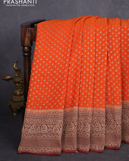 Banarasi georgette saree orange and brown with allover thread & zari woven buttas and long woven border