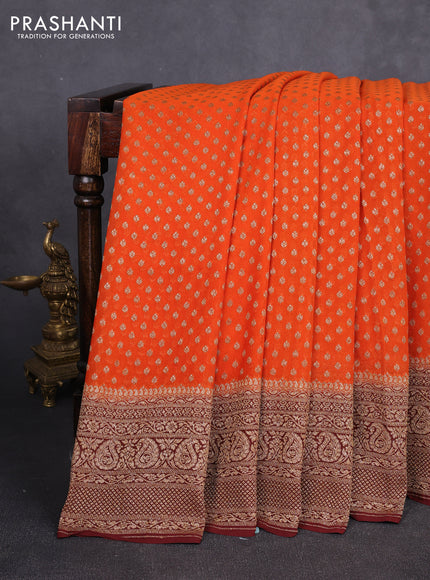 Banarasi georgette saree orange and brown with allover thread & zari woven buttas and long woven border