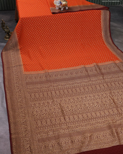 Banarasi georgette saree orange and brown with allover thread & zari woven buttas and long woven border