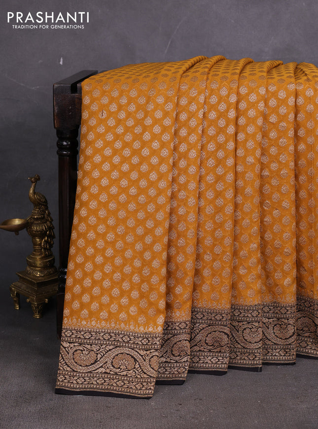 Banarasi georgette saree mustard yellow and black with allover thread & zari woven buttas and woven border