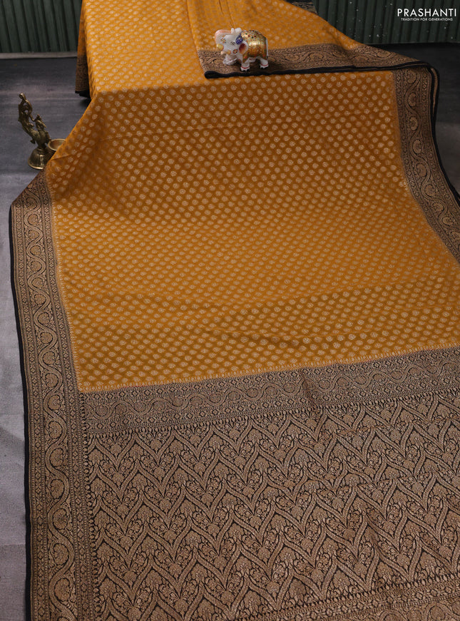 Banarasi georgette saree mustard yellow and black with allover thread & zari woven buttas and woven border